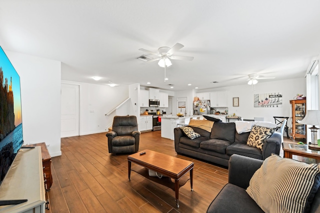 6143 Wildfire Way, West Palm Beach, FL 33415 - living area featuring a ceiling fan, wood finished floors, stairs, and recessed lighting