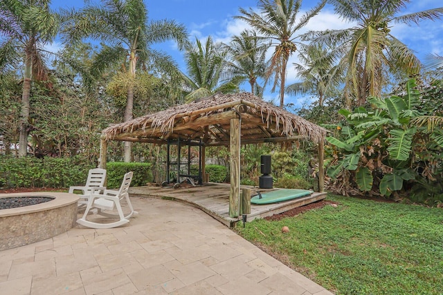 101 Saint Pierre Way, Jupiter, FL 33458 - view of patio featuring a gazebo and a fire pit