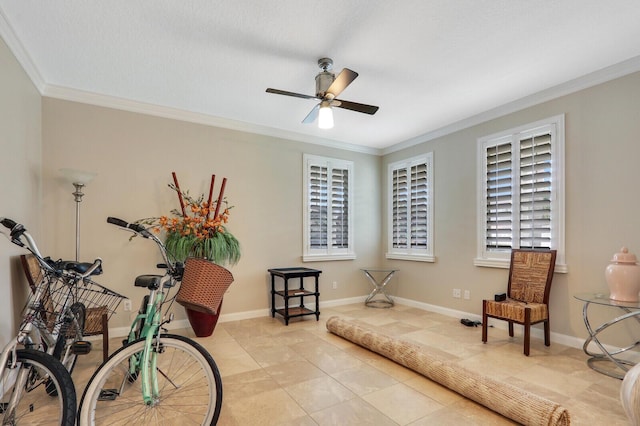 101 Saint Pierre Way, Jupiter, FL 33458 - living area featuring crown molding, a ceiling fan, baseboards, and tile patterned floors