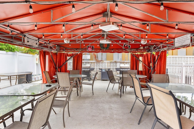 221 SE 9th Ave Unit 202, Pompano Beach, FL 33060 - view of patio featuring outdoor dining area and a gazebo