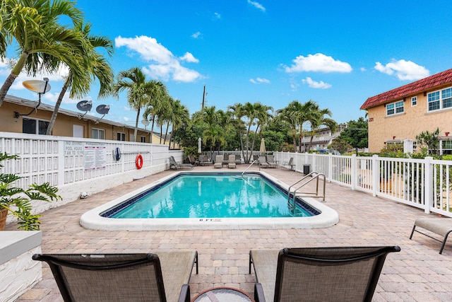 221 SE 9th Ave Unit 202, Pompano Beach, FL 33060 - community pool featuring a patio