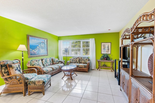 221 SE 9th Ave Unit 202, Pompano Beach, FL 33060 - living room with a textured ceiling and light tile patterned flooring