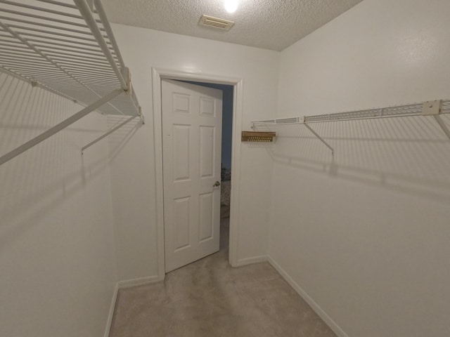1713 Mariners Cv Unit 7C, Fort Pierce, FL 34950 - walk in closet with light colored carpet