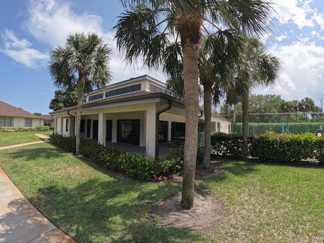1713 Mariners Cv Unit 7C, Fort Pierce, FL 34950 - view of side of property with stucco siding