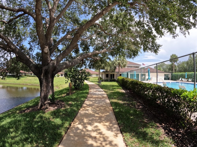 1713 Mariners Cv Unit 7C, Fort Pierce, FL 34950 - view of home's community featuring a swimming pool and a water view