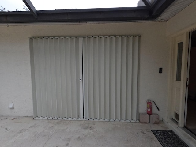 1713 Mariners Cv Unit 7C, Fort Pierce, FL 34950 - view of exterior entry featuring stucco siding
