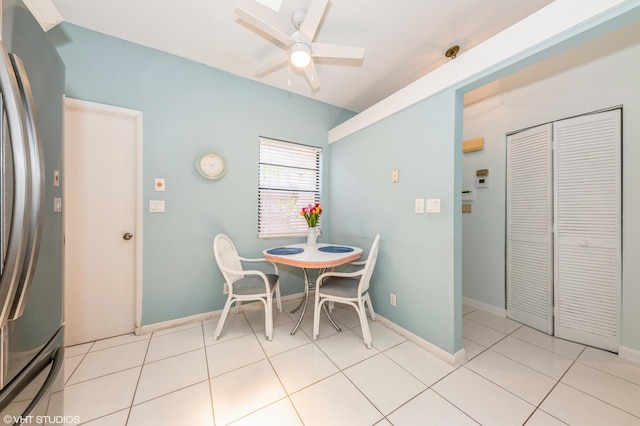 6491 Royal Manor Cir, Delray Beach, FL 33484 - dining space featuring ceiling fan, baseboards, and light tile patterned flooring