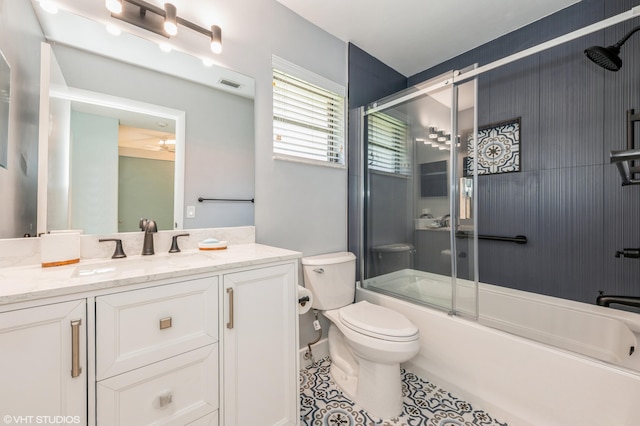 6491 Royal Manor Cir, Delray Beach, FL 33484 - full bath with vanity, toilet, bath / shower combo with glass door, and tile patterned flooring