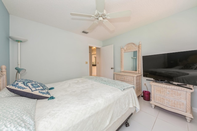 6491 Royal Manor Cir, Delray Beach, FL 33484 - bedroom with ceiling fan and light tile patterned floors