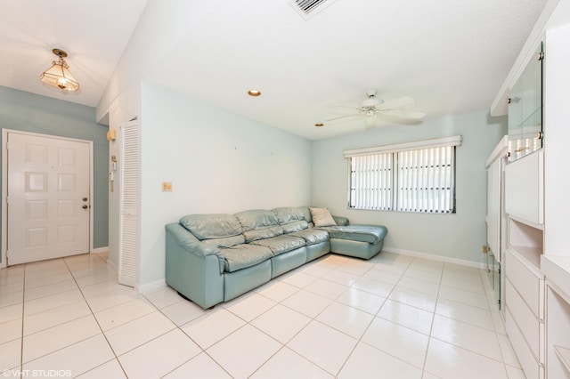 6491 Royal Manor Cir, Delray Beach, FL 33484 - living room featuring ceiling fan, light tile patterned floors, baseboards, and recessed lighting