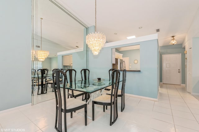 6491 Royal Manor Cir, Delray Beach, FL 33484 - dining area featuring a chandelier and baseboards