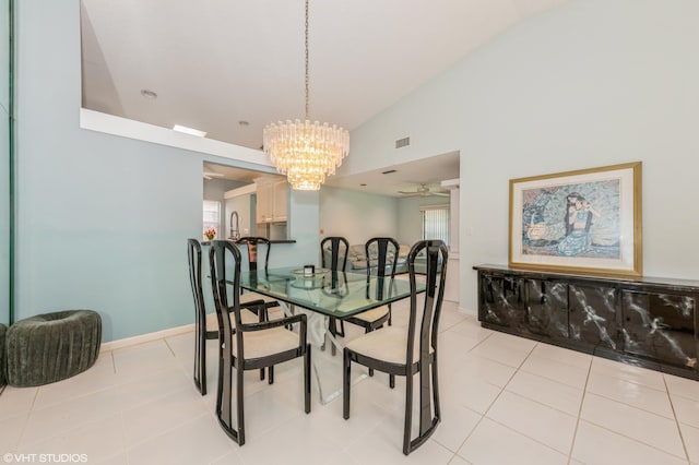 6491 Royal Manor Cir, Delray Beach, FL 33484 - dining space with a chandelier, high vaulted ceiling, light tile patterned flooring, and a ceiling fan