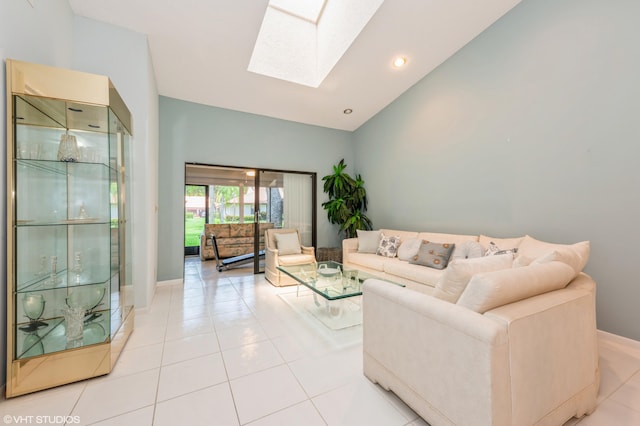6491 Royal Manor Cir, Delray Beach, FL 33484 - living area featuring a skylight, high vaulted ceiling, and light tile patterned flooring