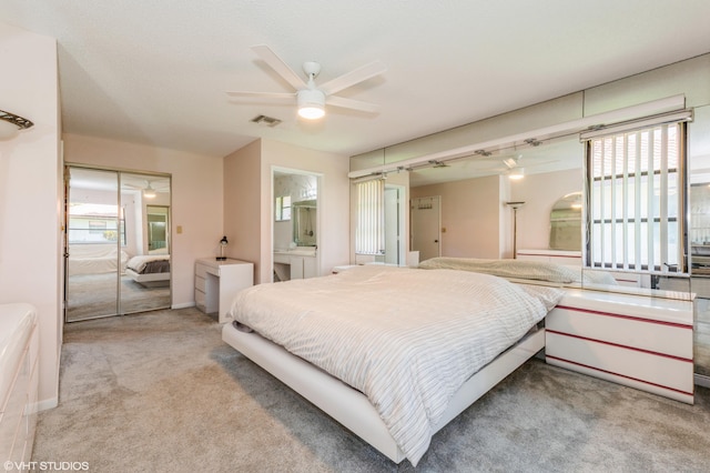 6491 Royal Manor Cir, Delray Beach, FL 33484 - bedroom featuring carpet flooring, ensuite bathroom, a closet, and a ceiling fan