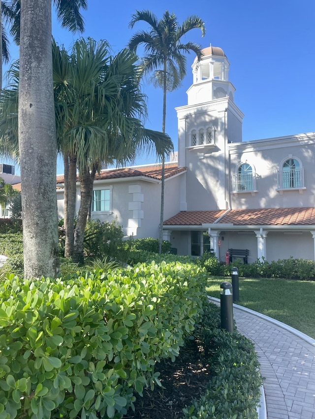 6491 Royal Manor Cir, Delray Beach, FL 33484 - view of property exterior with stucco siding and a tile roof