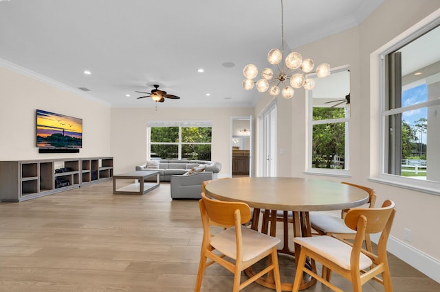 6688 Duckweed Rd, Lake Worth, FL 33449 - dining space with a ceiling fan, light wood-type flooring, recessed lighting, ornamental molding, and a chandelier