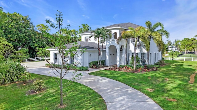 6688 Duckweed Rd, Lake Worth, FL 33449 - mediterranean / spanish home with stucco siding and driveway