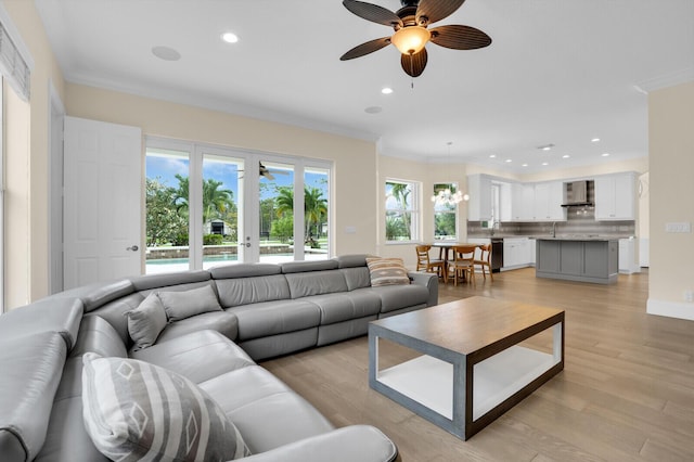 6688 Duckweed Rd, Lake Worth, FL 33449 - living room featuring recessed lighting, a ceiling fan, light wood-style floors, and ornamental molding