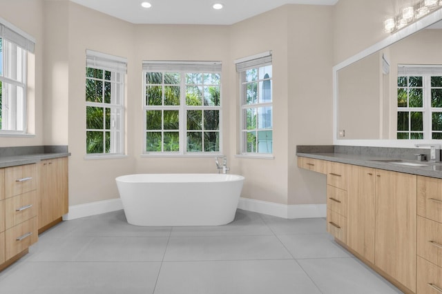 6688 Duckweed Rd, Lake Worth, FL 33449 - bathroom featuring vanity, baseboards, tile patterned floors, and recessed lighting