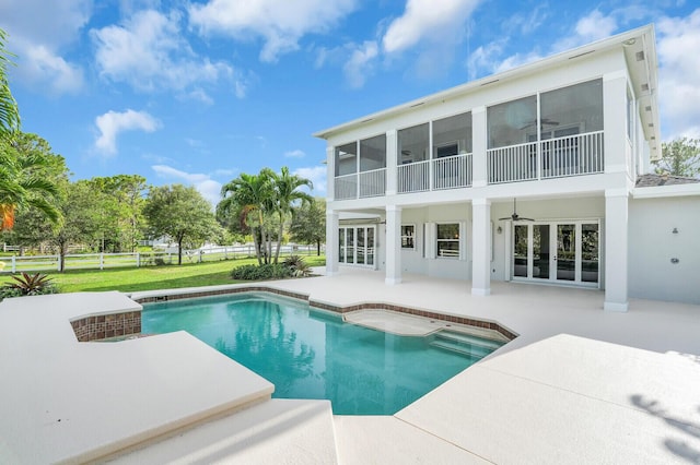 6688 Duckweed Rd, Lake Worth, FL 33449 - outdoor pool with a ceiling fan and a patio area