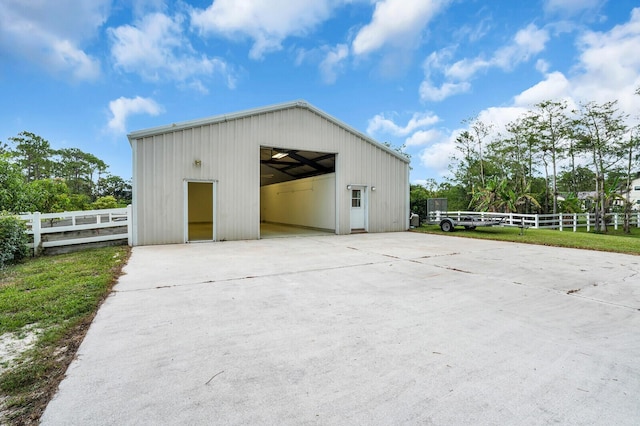 6688 Duckweed Rd, Lake Worth, FL 33449 - view of pole building with concrete driveway