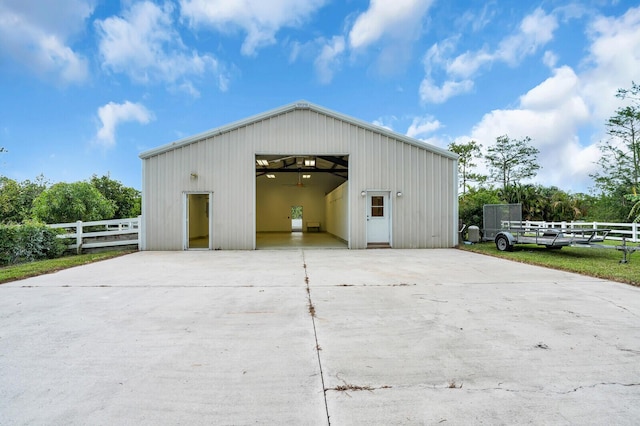 6688 Duckweed Rd, Lake Worth, FL 33449 - view of pole building featuring concrete driveway
