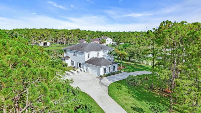6688 Duckweed Rd, Lake Worth, FL 33449 - aerial view of property and surrounding area with a forest