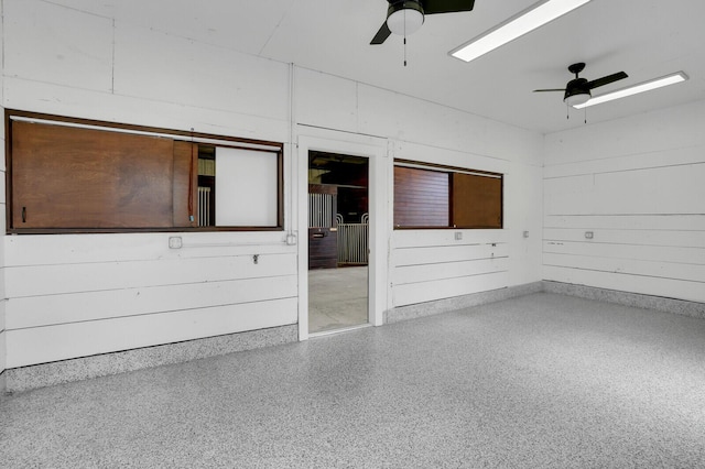 6688 Duckweed Rd, Lake Worth, FL 33449 - empty room with a ceiling fan and speckle patterned floor