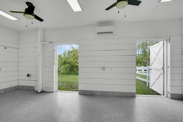 6688 Duckweed Rd, Lake Worth, FL 33449 - garage with ceiling fan and a wall mounted air conditioner