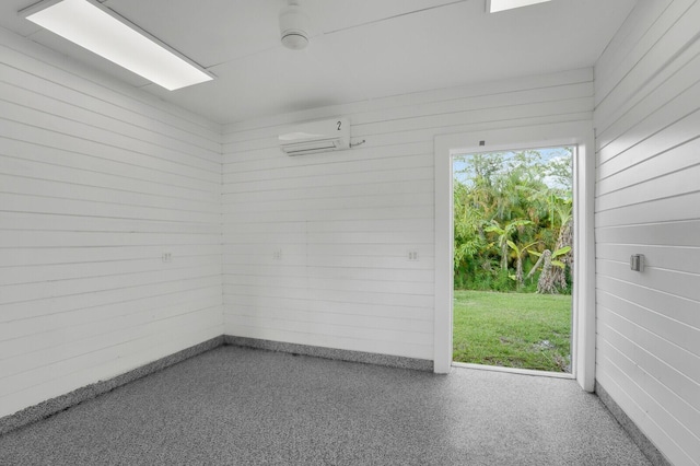 6688 Duckweed Rd, Lake Worth, FL 33449 - empty room with a wall mounted air conditioner and wooden walls