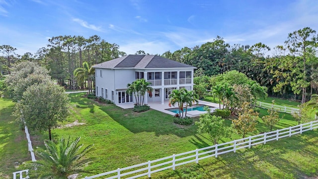 6688 Duckweed Rd, Lake Worth, FL 33449 - back of property featuring a patio area, a balcony, and stucco siding
