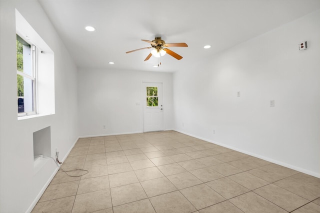 6688 Duckweed Rd, Lake Worth, FL 33449 - spare room with ceiling fan, recessed lighting, light tile patterned floors, and baseboards