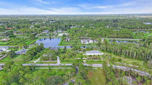 6688 Duckweed Rd, Lake Worth, FL 33449 - aerial view of property's location featuring a nearby body of water and a heavily wooded area