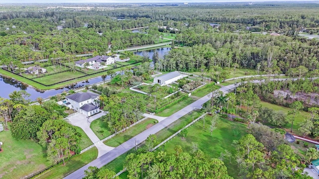 6688 Duckweed Rd, Lake Worth, FL 33449 - aerial view of property's location featuring a heavily wooded area and a large body of water