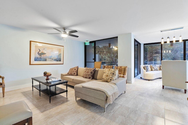 2401 N Ocean Blvd Unit 2N, Boca Raton, FL 33431 - living area featuring expansive windows, ceiling fan, plenty of natural light, and light tile patterned floors