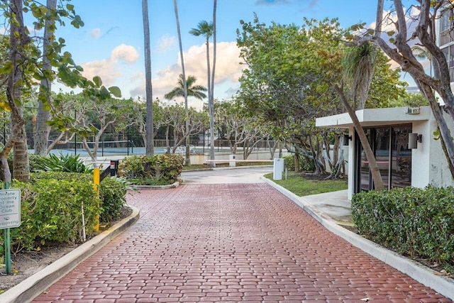 2401 N Ocean Blvd Unit 2N, Boca Raton, FL 33431 - view of property's community featuring a tennis court
