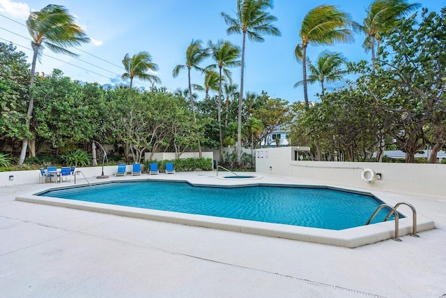 2401 N Ocean Blvd Unit 2N, Boca Raton, FL 33431 - community pool with a patio and a hot tub