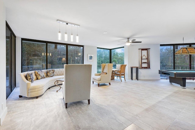 2401 N Ocean Blvd Unit 2N, Boca Raton, FL 33431 - living area with floor to ceiling windows, ceiling fan, and billiards table