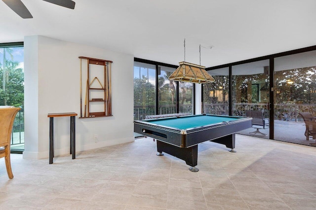 2401 N Ocean Blvd Unit 2N, Boca Raton, FL 33431 - playroom featuring ceiling fan, pool table, floor to ceiling windows, and tile patterned floors