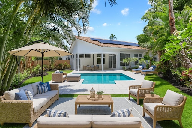 6607 NW 25th Way, Boca Raton, FL 33496 - view of swimming pool featuring an outdoor living space, a patio area, and a fenced backyard