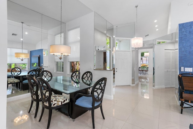 6607 NW 25th Way, Boca Raton, FL 33496 - dining room with a chandelier, baseboards, healthy amount of natural light, recessed lighting, and a towering ceiling