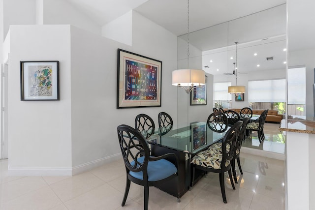 6607 NW 25th Way, Boca Raton, FL 33496 - dining space featuring baseboards, light tile patterned flooring, and a chandelier