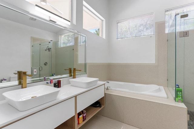 6607 NW 25th Way, Boca Raton, FL 33496 - bathroom with a bath, a shower stall, double vanity, and tile patterned flooring