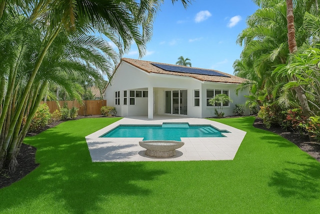 6607 NW 25th Way, Boca Raton, FL 33496 - back of house with a patio, solar panels, and stucco siding