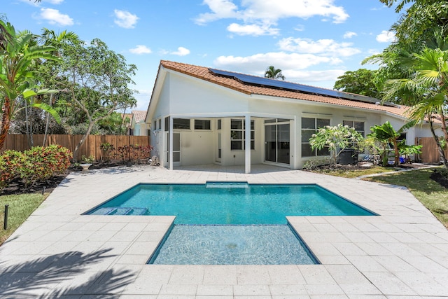 6607 NW 25th Way, Boca Raton, FL 33496 - view of swimming pool with a patio area, a fenced backyard, and a sunroom