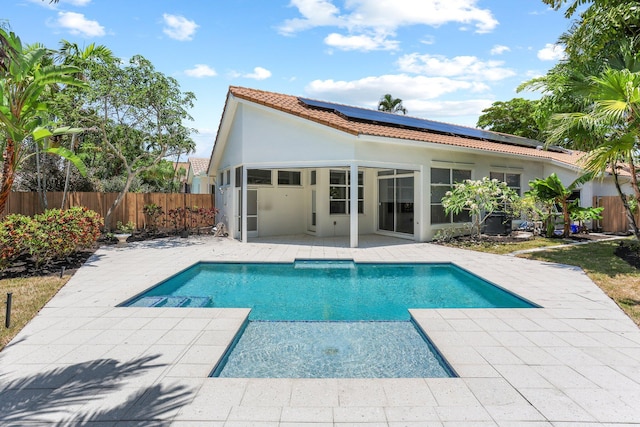 6607 NW 25th Way, Boca Raton, FL 33496 - view of swimming pool featuring a patio area, a fenced backyard, and a sunroom