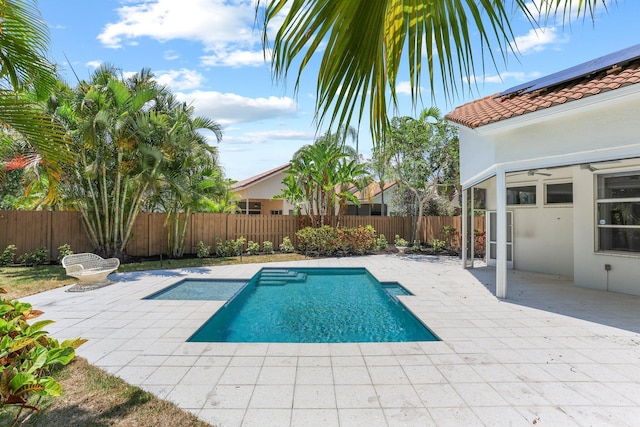 6607 NW 25th Way, Boca Raton, FL 33496 - view of pool featuring a fenced backyard and a patio