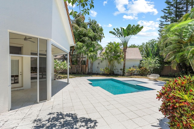 6607 NW 25th Way, Boca Raton, FL 33496 - view of swimming pool featuring a patio area and a fenced backyard