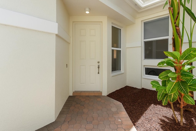 6607 NW 25th Way, Boca Raton, FL 33496 - property entrance with stucco siding
