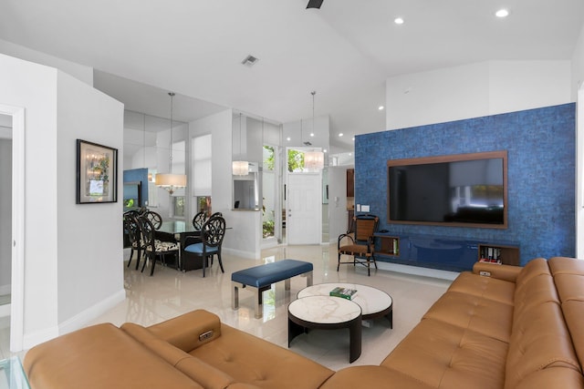 6607 NW 25th Way, Boca Raton, FL 33496 - living room with baseboards, light tile patterned flooring, recessed lighting, and high vaulted ceiling